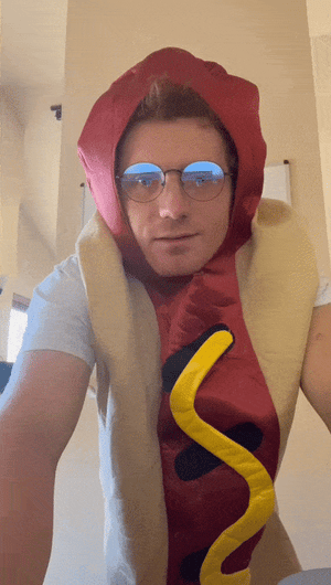 GIF of Will Falkenborg video outreach in hot dog costume